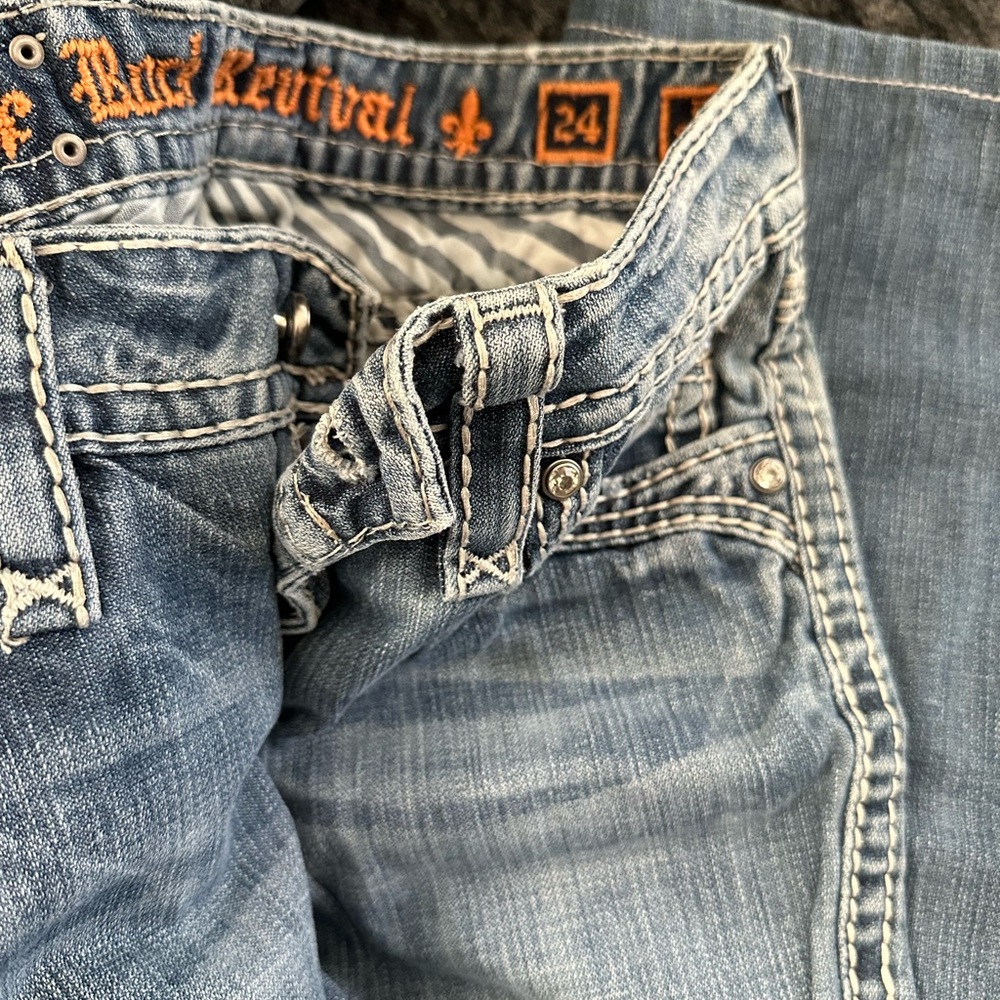Rock Revival Light Blue Jeans with Orange Accents